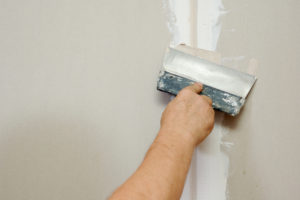 DIY Painting, repair drywall with spackle
